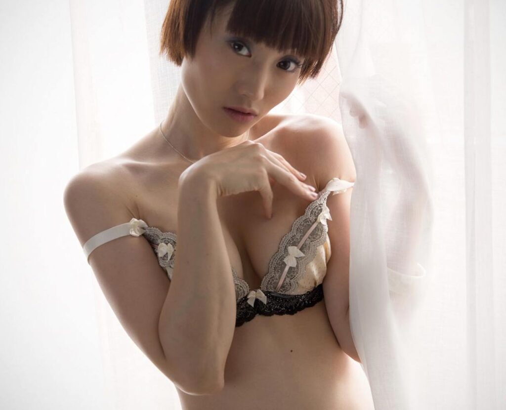 Mizuki, a Japanese Leg and Foot Fetish model posing in lingerie for Legs Japan.