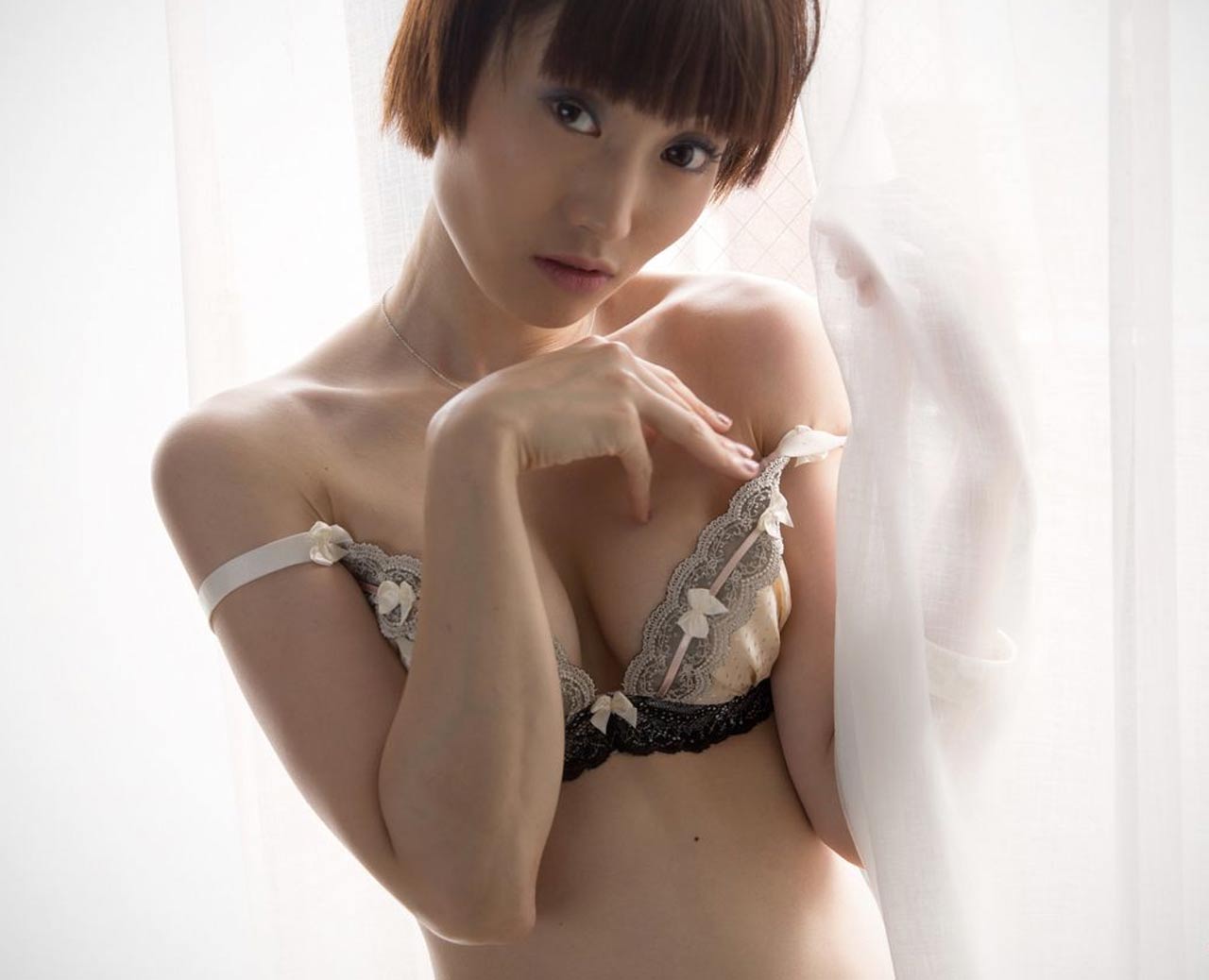 Delicate Mizuki, a Japanese Leg and Foot Fetish model posing in lingerie for Legs Japan.