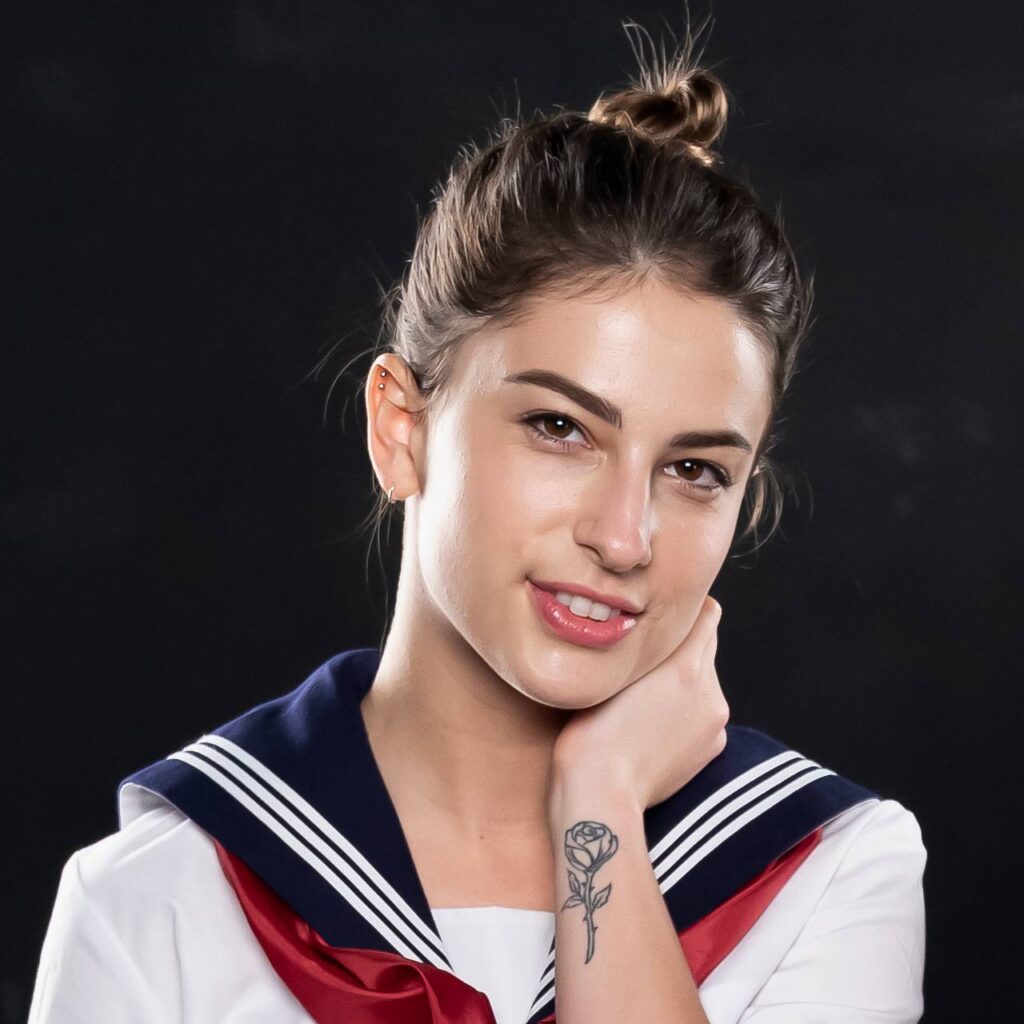 Kristen Scott, Cosplay girl and Supermodel, dressed as a Sailor Moon schoolgirl for Cospuri